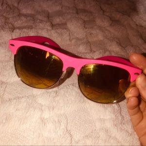 Hot pink and golden tinted sunglasses